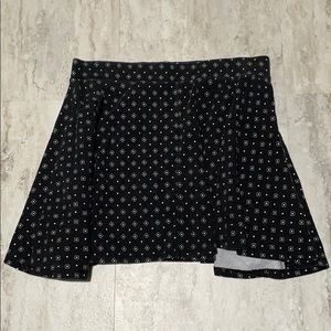 Black a-line mini skirt with print